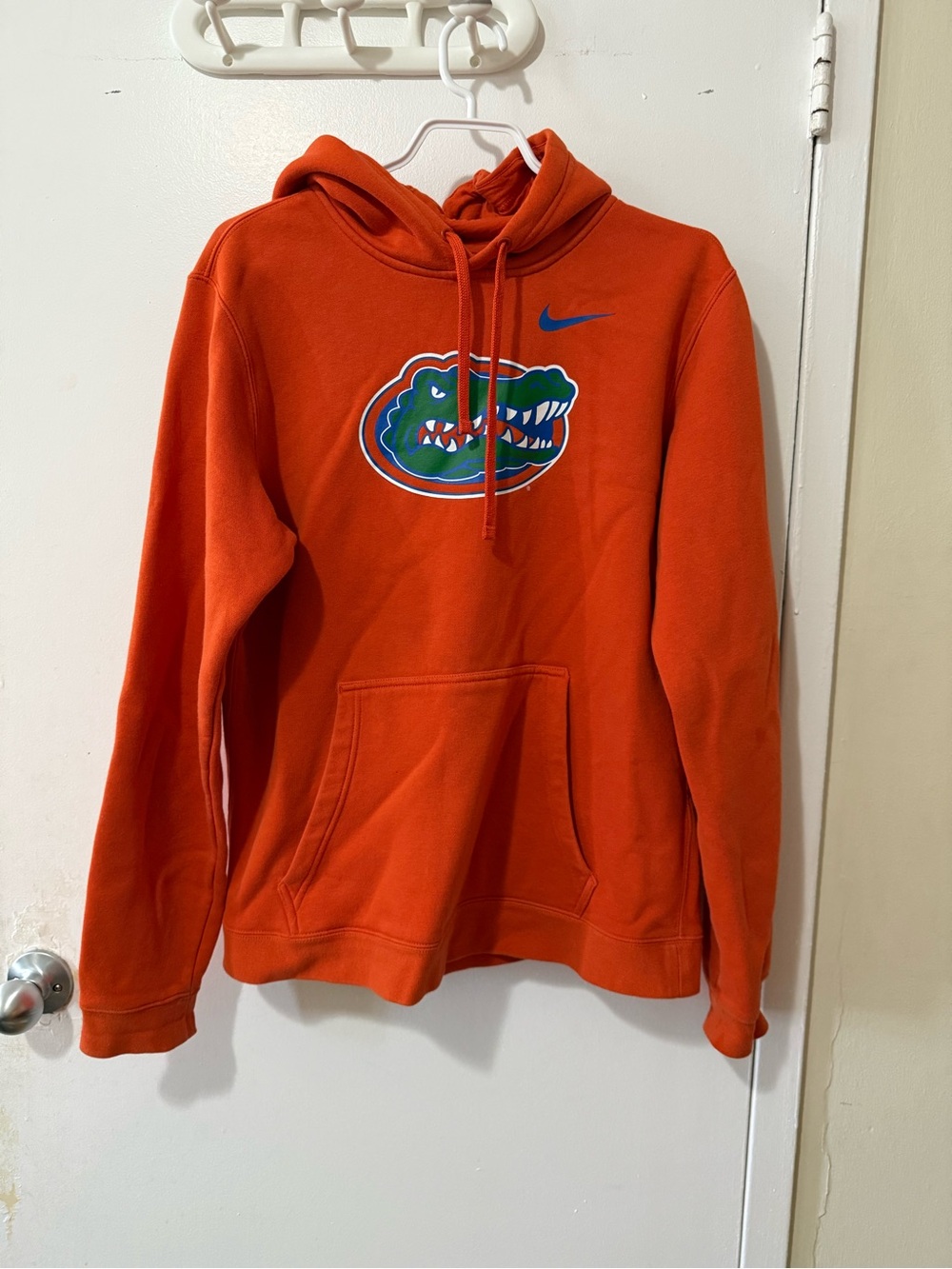 Nike Orange Pullover Hoodie with Blue Swoosh